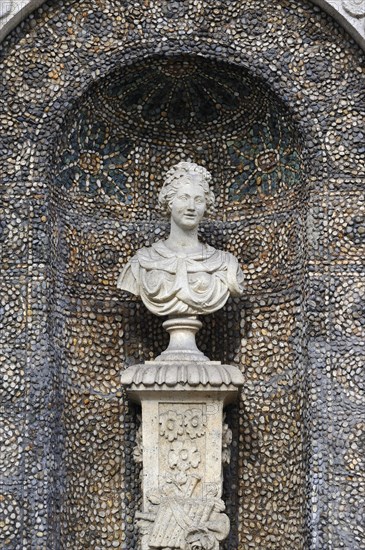 Stone bust on a wall of the Bavarian National Museum