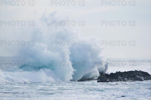 Waves breaking on the shore