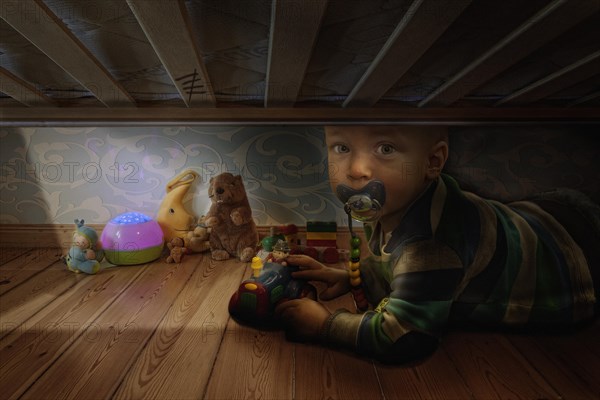 A young boy checking whether all monsters
