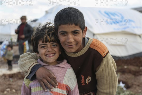Children in a camp for Syrian refugees of the civil war near the Turkish border