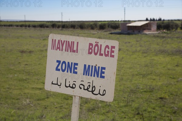 A sign warning of land mines on the Syrian-Turkish border