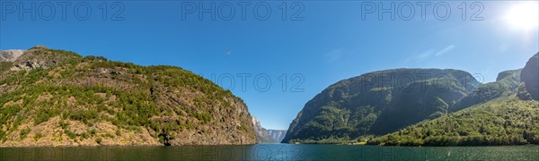 Narrow fjord between steep mountains