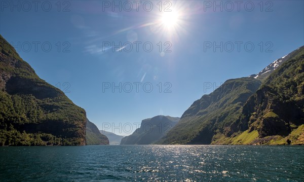 Narrow fjord between steep mountains