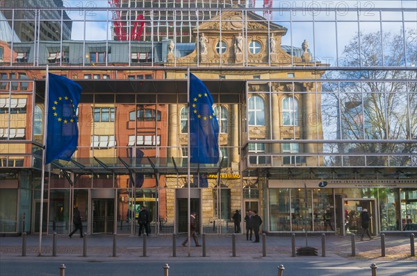 Facade of the EuroTowers with reflections of the Commerzbank branch on the opposite side of the street