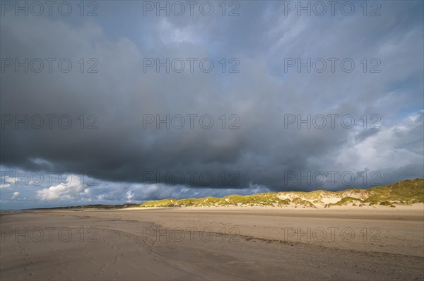 Dramatic cloud formation over a North Sea beach