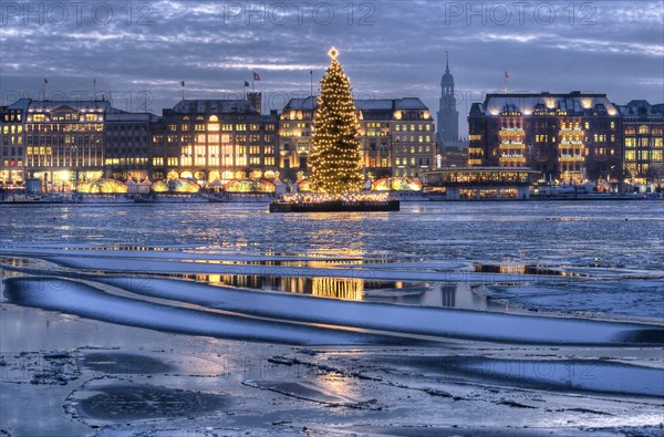 Binnenalster or Inner Alster Lake with a Christmas tree and Jungfernstieg