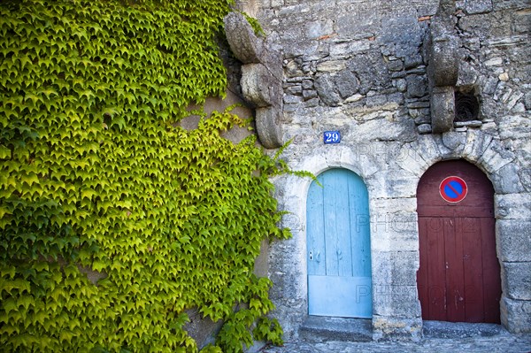 Old stone building with two doors