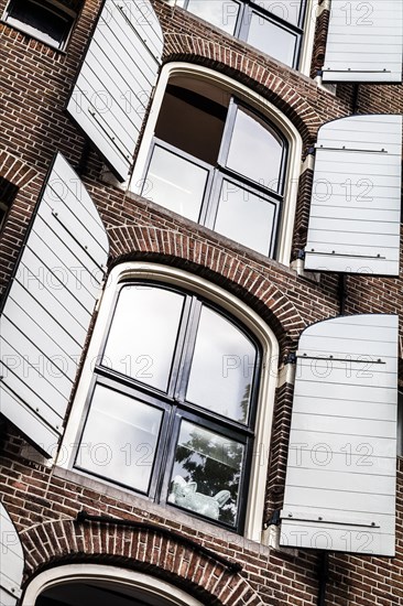 Windows of a house on Brouwersgracht canal