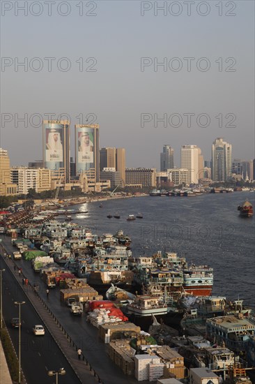 Views over Dubai Creek with traditional wooden boats known as dhow