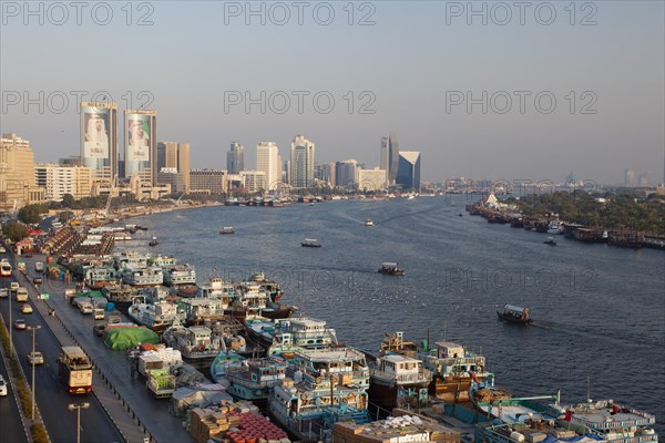 Dubai Creek with old dhows laden with cargo