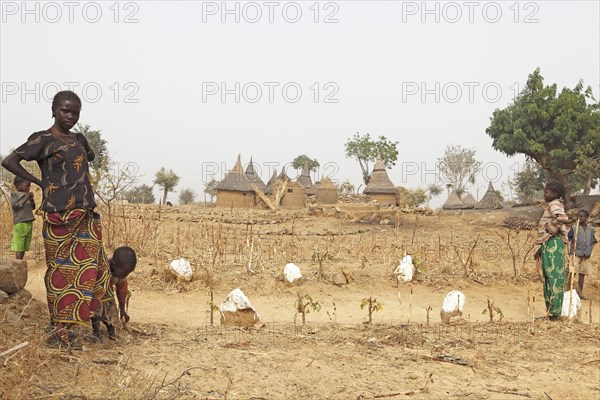 Woman and children of the Mafa people on their homestead