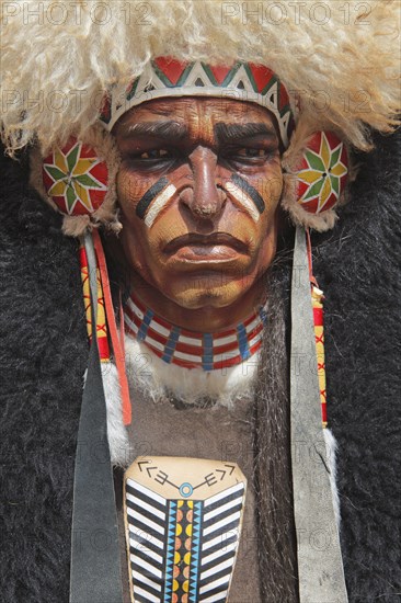 American Indian head on the sign of a dance group