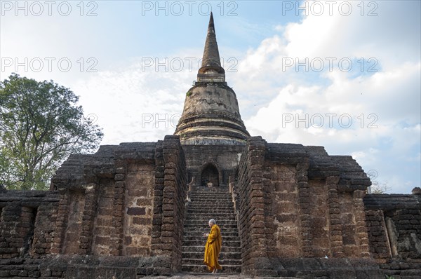 Praying Buddhist monk