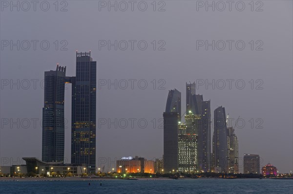 The skyline of Abu-Dhabi at dusk