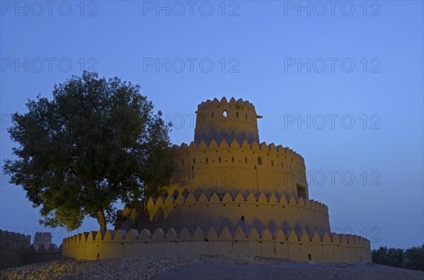 A tower of the Al Ain Palace Museum or Sheikh Zayed Palace Museum at dawn