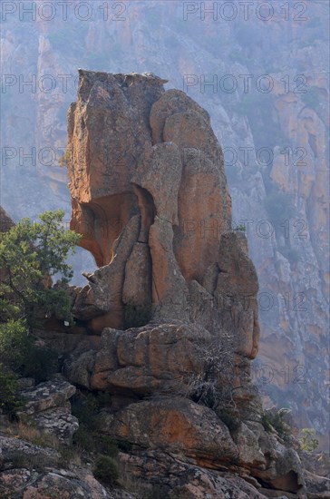 The typical bizarre red rocks of the Calanche of Piana. The Calanche of Piana is in the western part of the island Corsica