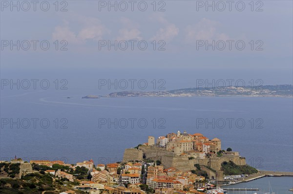 The citadel (castle) of Calvi surrounded by the mediterranean sea. Calvi is in the department Haute-Corse