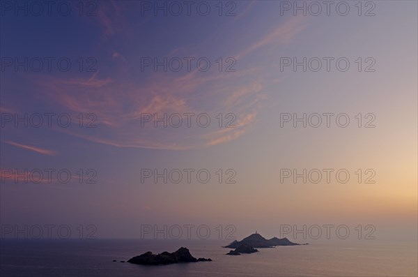 Les Iles Sanguinaires in the mediterranean sea at the blue hour after sunset seen from Tour de la Parata. Les Iles Sanguinaires are in the department Corse-du-Sud