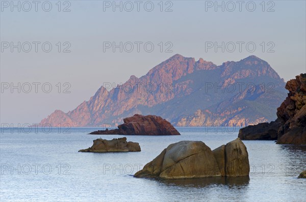 The Gulf of Porto with the surrounding mountains in the morning light