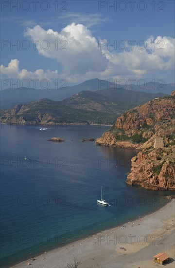 The Genoese Tower of Porto on top of a rocky hill and the Gulf of Porto