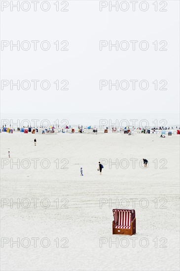 People and beach chairs on the beach