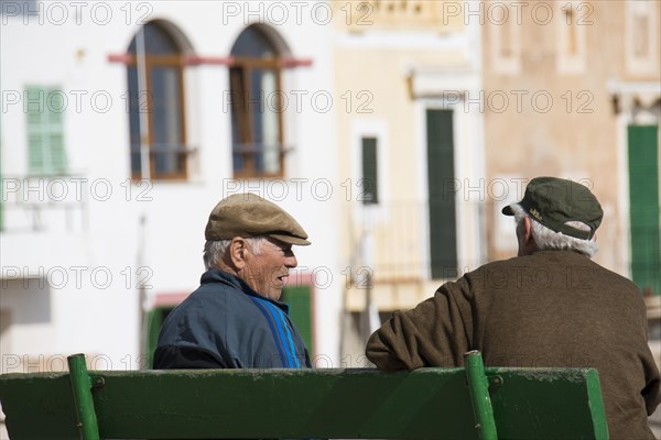 Elderly men at the harbour