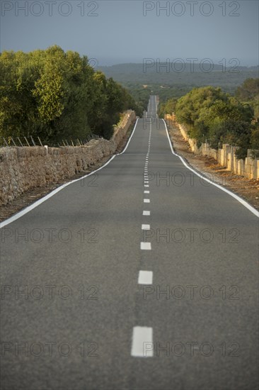 Road and landscape with dry stone walls