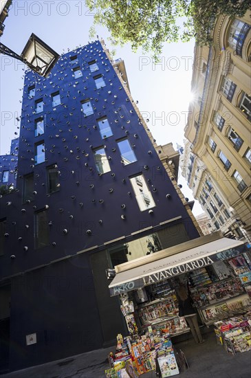 Blue House facade and a magazine kiosk