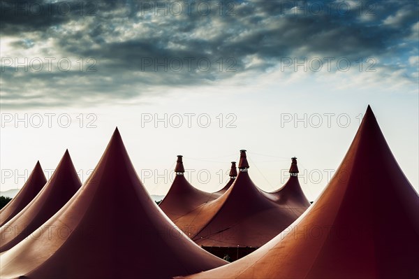 Circus tents and an evening sky