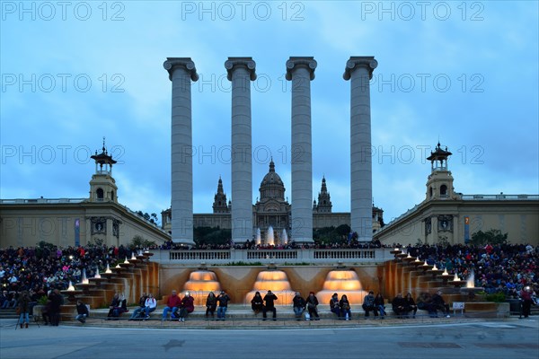 Crowd waiting for the Font Magica magic fountain to light up at dusk