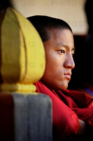 Spectator at a monastery festival in Jakar Dzong fortress