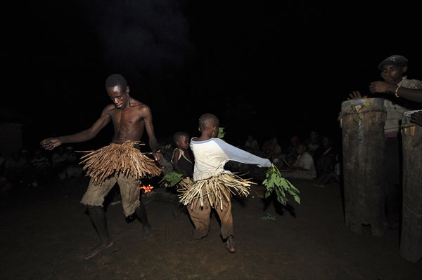 Pygmies of the Bakola people celebrating with song and dance