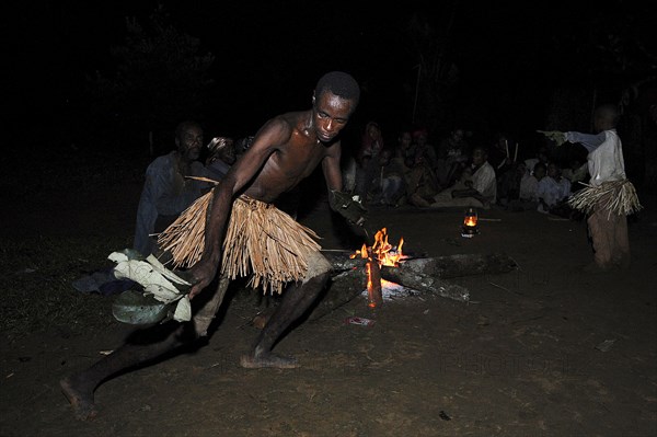 Pygmies of the Bakola people celebrating with song and dance