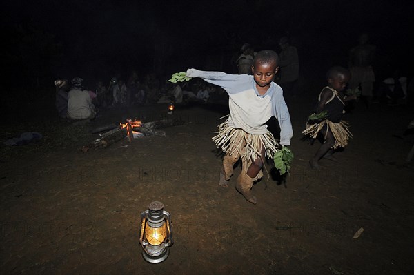 Pygmies of the Bakola people celebrating with song and dance