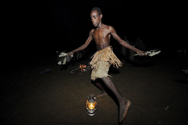 Pygmies of the Bakola people celebrating with song and dance