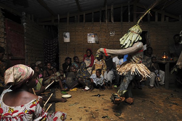 Pygmies of the Bakola people celebrating with song and dance