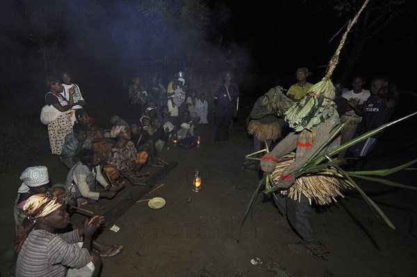 Pygmies of the Bakola people celebrating with song and dance