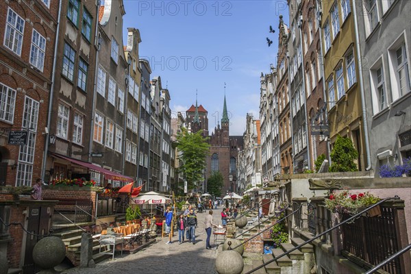 Mariacka Street or Ulica Mariacka with the historic patrician houses and their porches or elevated terraces