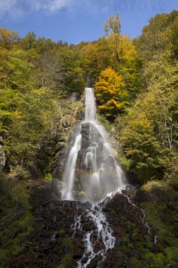 Waterfall in an autumnal landscape in Trusetal