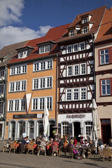 Half-timbered buildings and restaurant in the historic town centre at Domplatz square