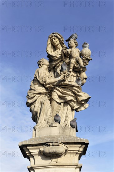 Stone statue of St Anne