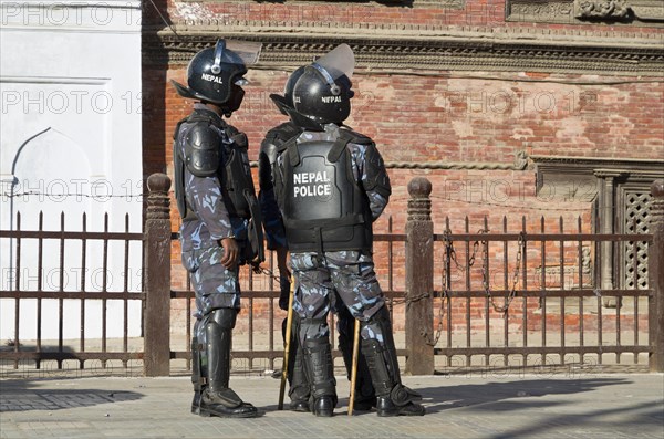 A group of policemen observing a demonstration at Durbar Square