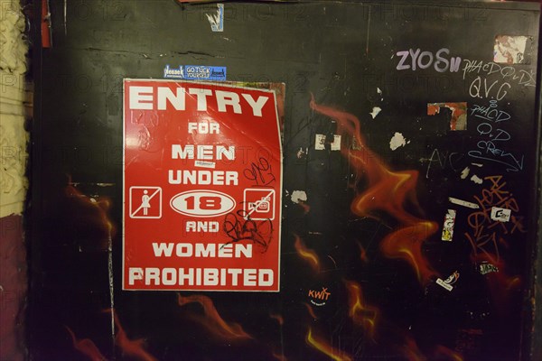 Sign 'Entry for men under 18 and women prohibited' at the entrance to Herbertstrasse street in the Red Light District