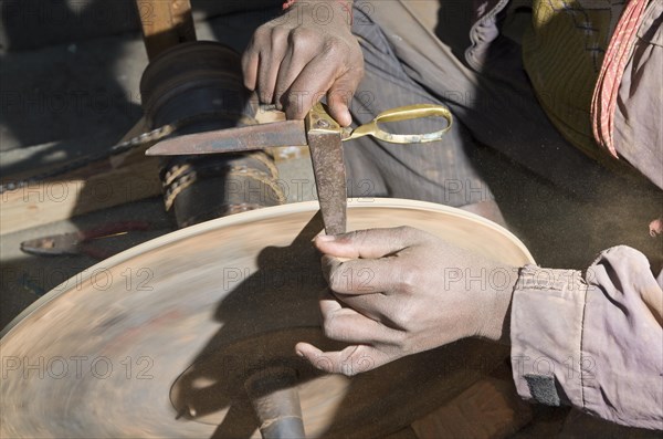 Knife grinder at work