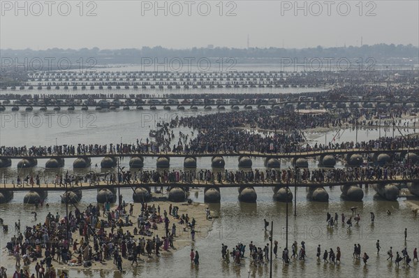 Many pontoon bridges crossing the river Ganges at the Kumbha Mela grounds
