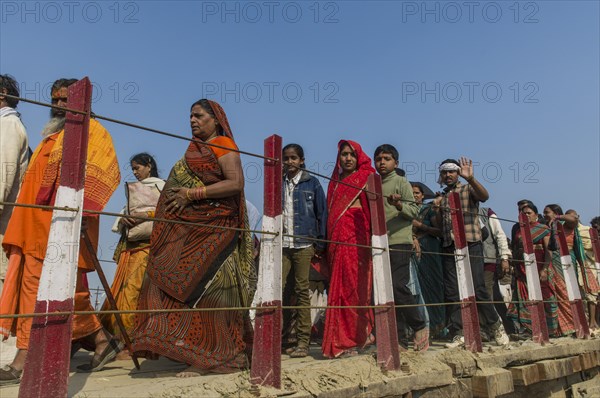 Crowds of people arriving at Kumbha Mela grounds