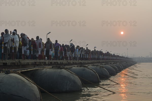 Crowds of people arriving at Kumbha Mela grounds