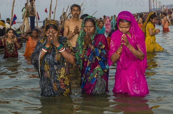 Women taking a bath in the Sangam