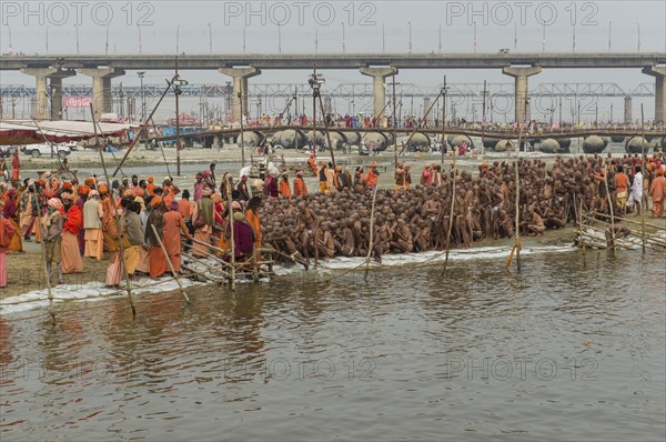 Sitting in silence as part of the initiation of new sadhus at the Sangam