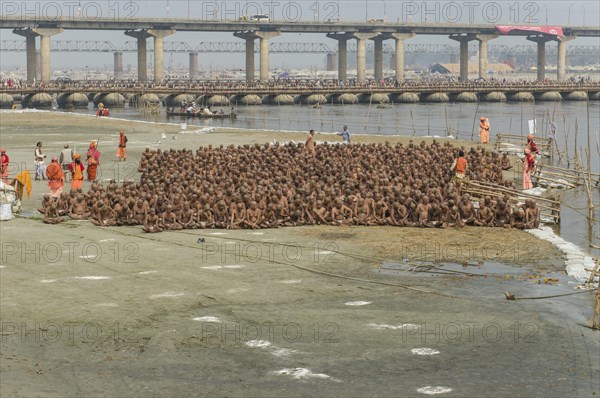 Sitting in silence as part of the initiation of new sadhus at the Sangam